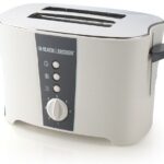 بلاك آند ديكر 2 شريحة محمصة توستر بلمسة باردة، أبيض - ET122-B5